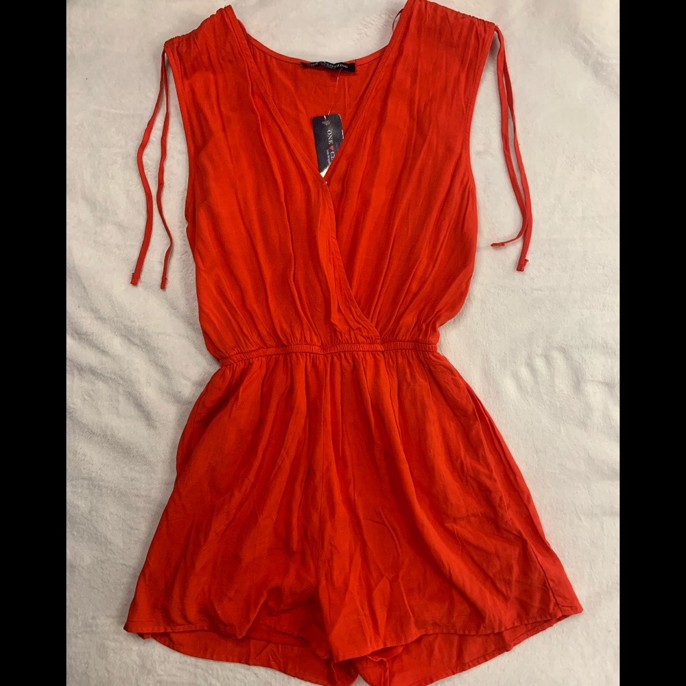 Red Romper With a Cinced Waist